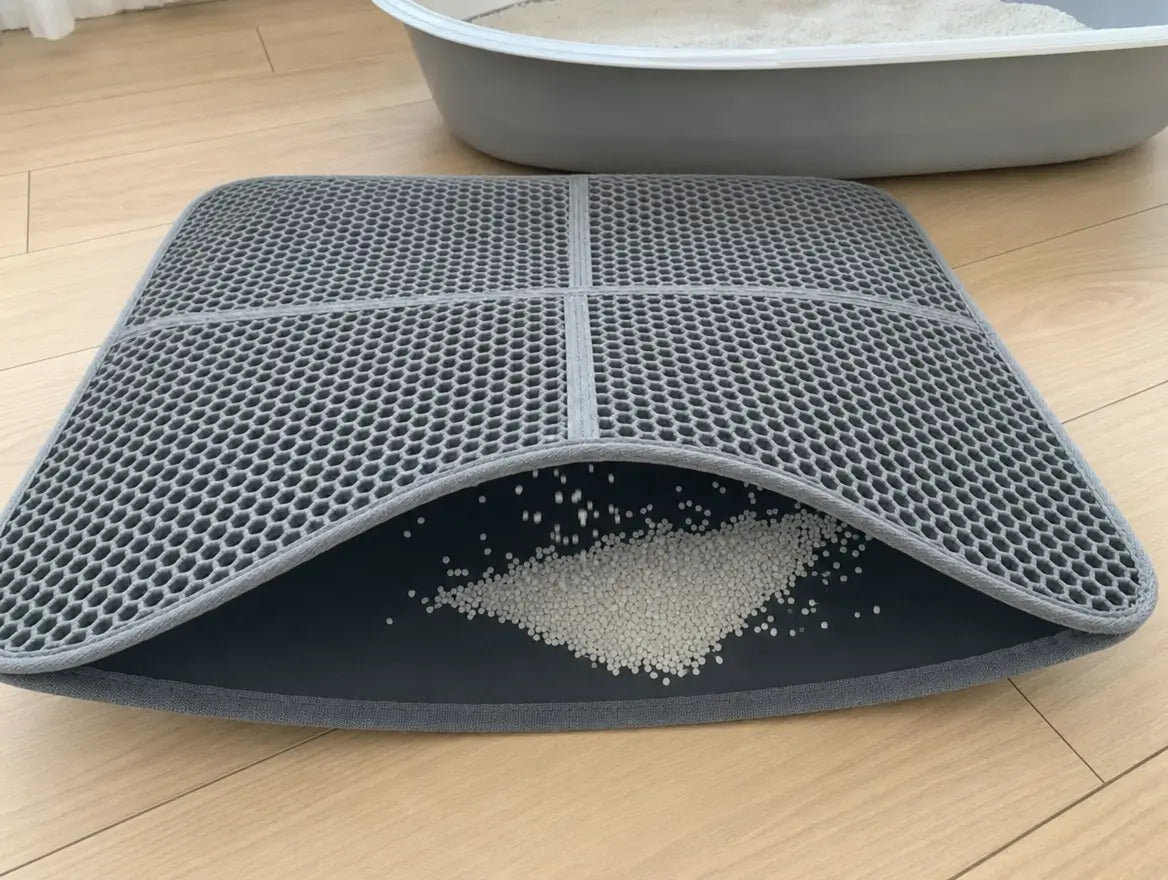 Angehobene XL-Matte, die die zwischen den beiden Lagen aufgefangenen Streukörner zeigt